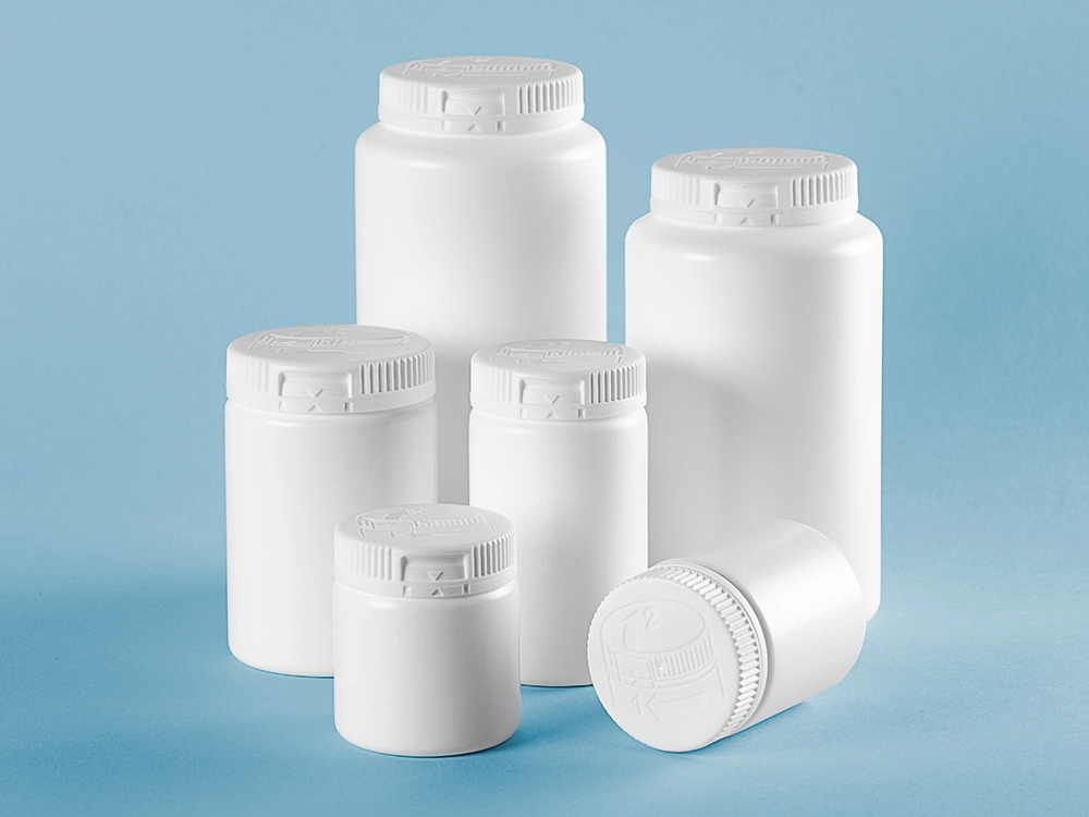 Nolato Pharma Packaging grupp av burkar